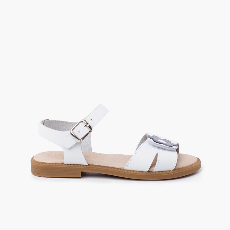 Wide strap adherent flower sandal with buckle closure
