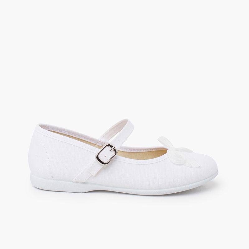 Mary janes with pearl-shine bow