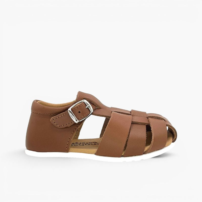 Boys’ barefoot closed leather sandals