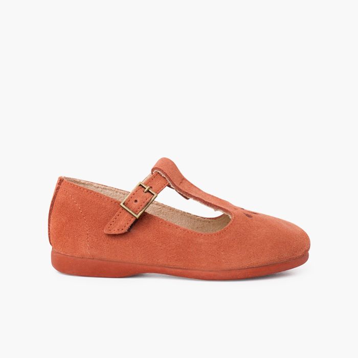 Retro mary janes with hold details and central strap