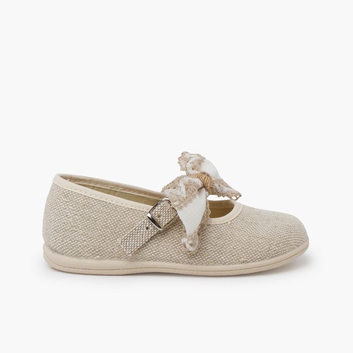 Bow and lace up Mary Janes ceremonies