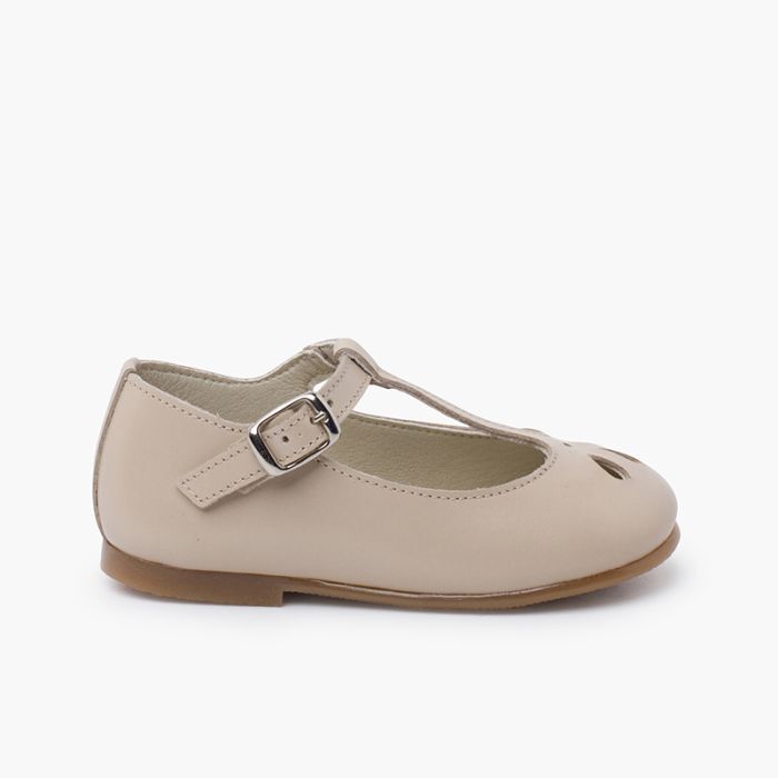 Pearly leather Mary Janes die-cut design