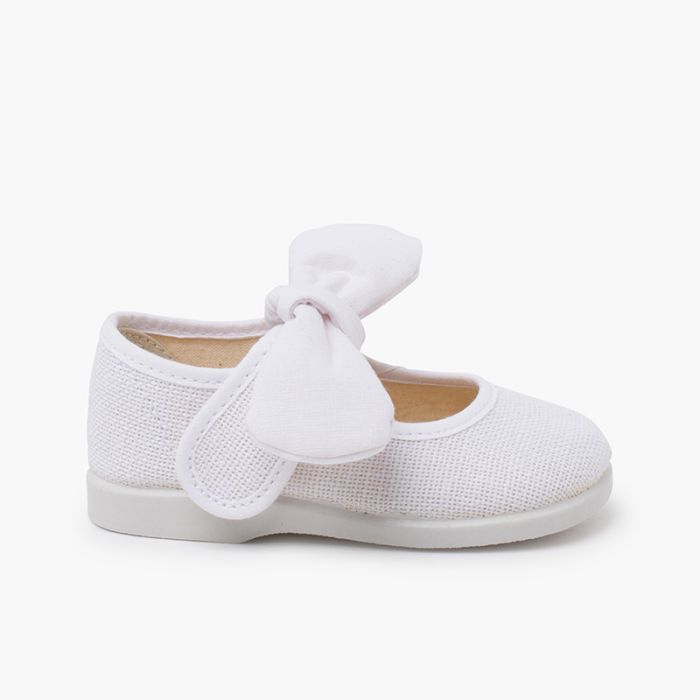 Linen mary janes with bow and hook-and-loop closure