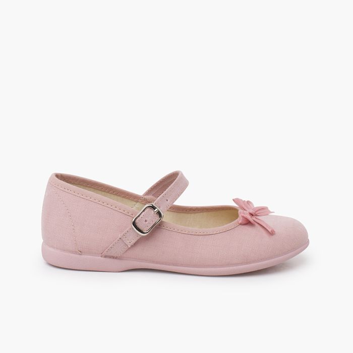Mary janes with pearl-shine bow