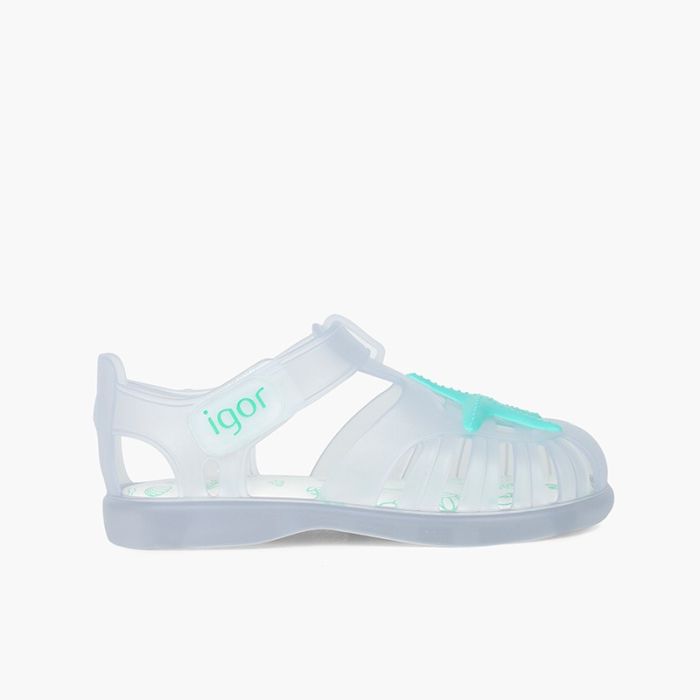 Jelly shoes with loop fasteners and a starfish