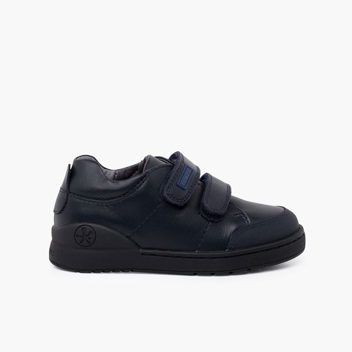 Biomecanics school shoes with adherent strips